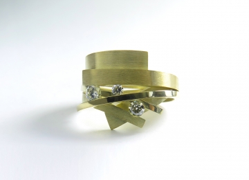 Brede gouden wikkelring brede_gouden_ring.jpg